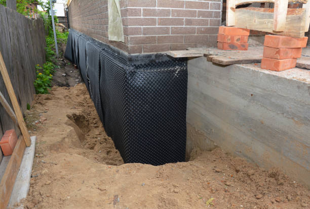 SJ Waterproofing Pros technician performing targeted Vapor Barrier Installation assessment in Luckey, OH